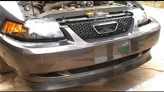 How to Install Replace a Front Bumper Cover and Header Panel on a 1999  2004 Ford Mustang [upl. by Akialam]