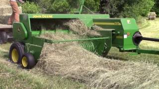 John Deere 348 Square Baler  Baling 1st Cut Timothy Hay [upl. by Atinev]