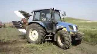 New Holland TL100A pluging [upl. by Ruy783]