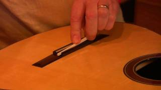 Stringing up a guitar part 5 putting on the strings [upl. by Akinahs]