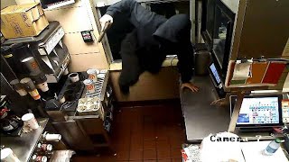 Man climbs through McDonalds drivethrough window steals cash register [upl. by Bear]