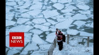 Chicagos frozen river from above  BBC News [upl. by Williams]