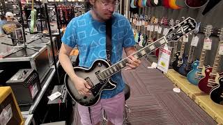 Silverburst Epiphone Les Paul Custom  Playing at Guitar Center [upl. by Ardiedal837]