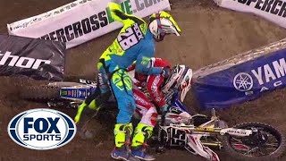 Riders fight after crash at Supercross event  FOX SPORTS [upl. by Enilorak]