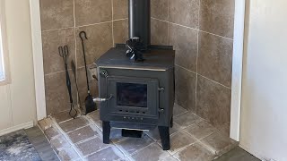 Wood Stove and Stove Pipe Installation Through A METAL ROOFTiny Log Cabin Build Part 21 [upl. by Ymmas]