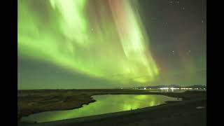 Northern lights reflect near Vestrahorn in Iceland [upl. by Cruz768]