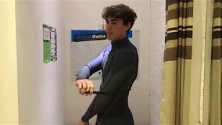 Wetsuit Guide How To Put On A BackZip Wetsuit [upl. by Inat]