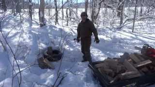 Firewood gathering in winter using Skandic snowmobile Fiskars X27 maul Otter sled Husqvarna 562xp [upl. by Milly]