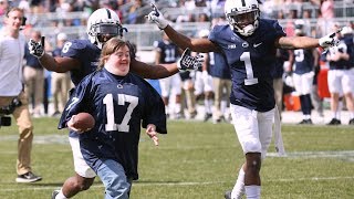 Fan With Down Syndrome Gets To Score Touchdown at College Game [upl. by Haidabez]