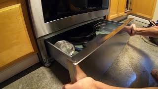 HOW TO REMOVE AND REPLACE THE LOWER DRAWER OF A SAMSUNG ELECTRIC STOVE [upl. by Aivatnuahs]