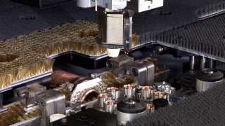 TRUMPF punch laser processing TruMatic 7000  How the automatic nozzle changer works [upl. by Ydiarf]