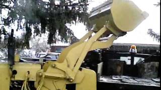 unloading firewood with hough payloader [upl. by Notsew365]