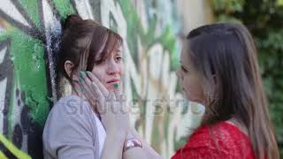 stock footage sad woman crying while hugging a friend color [upl. by Afatsum]