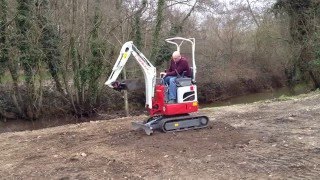 First Try Of The New Takeuchi TB210R Mini Excavator [upl. by Nwadahs]