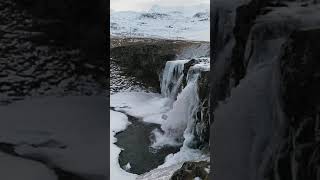 Kirkjufell in Iceland 🇮🇸 iceland waterfall icelandtravel icelandtrip snow winter [upl. by Erika]