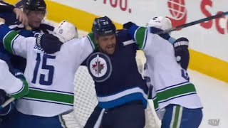 Dustin Byfuglien Takes on Two Canucks [upl. by Anthea247]