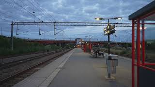 Sweden Stockholm Rotebro Train Station Arlanda Express passing by [upl. by Eerahc926]