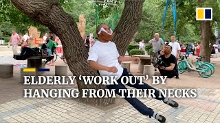 Elderly Chinese do ‘neck workouts’ by hanging from trees [upl. by Smeaj]