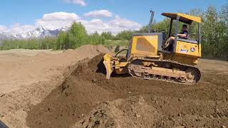 Leveling a Pad John Deere dozer [upl. by Partan]