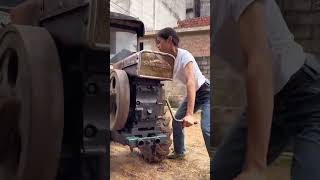 Starting process of a handcranked diesel engine [upl. by Adnahs]