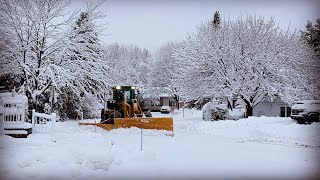 Plowing Residential streets with Cat loader 950M [upl. by Anairuy]