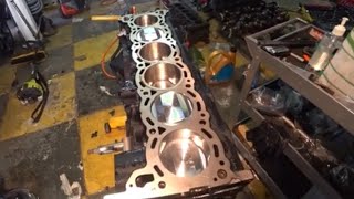 Rb25DET Build  Installing Pistons into engine block [upl. by Hamal]