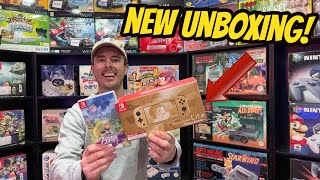 NEW Nintendo Switch Lite Hyrule Edition Unboxing [upl. by Ennaesor29]