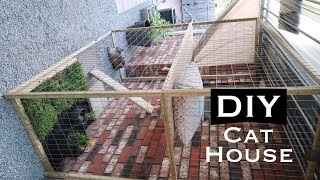 DIY INEXPENSIVE OUTDOOR CAT HOUSE ENCLOSURE [upl. by Atiuqat]