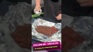 Wrapping pork spare ribs on my chargriller [upl. by Ynaffit167]