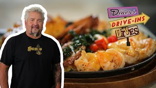 Guy Fieri Eats a Cheesy Shrimp Hot Plate  Diners DriveIns and Dives  Food Network [upl. by Pryor563]