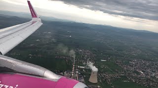 Wizz Air A320 cloudy descent and landing at Prishtina Airport [upl. by Ettenahc]