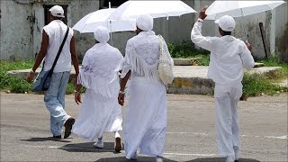 PORQUE LOS SANTEROS NOS VESTIMOS DE BLANCO Y NOS TAPAMOS LA CABEZA [upl. by Fogarty]