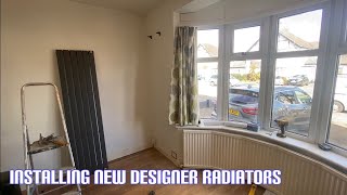 Installing anthracite designer radiators [upl. by Auohs]