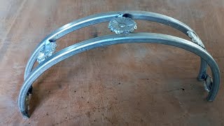 Bending iron flowers to make decorative shelf legs by a welder [upl. by Libenson509]