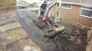 Digging up a Tarmac Driveway with Takeuchi TB216 Excavator or mini digger [upl. by Plerre971]