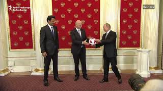 Russia Passes World Cup Ball To Qatar [upl. by Lantz767]