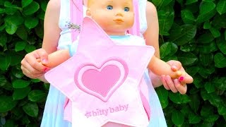 Bitty Baby gets ready for walk in the baby carrier Play Toys [upl. by Llerrod]