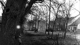 US troops search for German defenders in Haguenau France during World War II HD Stock Footage [upl. by Ettenrahc]