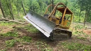 John Deere Dozer making logging roads G660 first tree [upl. by Rebmat]