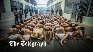 Thousands of El Salvador gang members moved to new mega prison [upl. by Esyak]