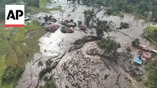 Flash floods cold lava flow hit Indonesia’s Sumatra island killing at least 37 [upl. by Grider]