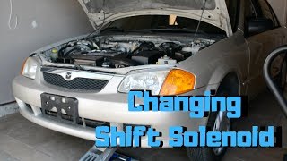 2000 Mazda Protege Changing the Shift Solenoid [upl. by Itsur]