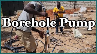 Submersible Borehole Pump Installation  Building A House In Ghana  Episode 39 [upl. by Artema649]