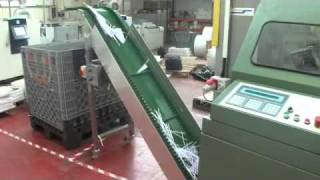 Waste conveyor on Muller Martini Merit trimmer [upl. by Paulette707]