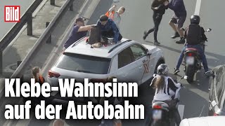 Klimakleber steigen Auto aufs Dach Autofahrer außer sich [upl. by Aneehsit949]